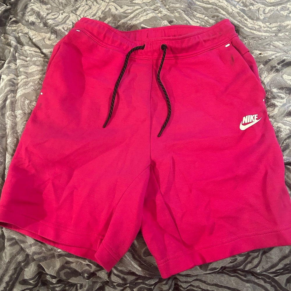 Pink Nike sportswear tech fleece shorts